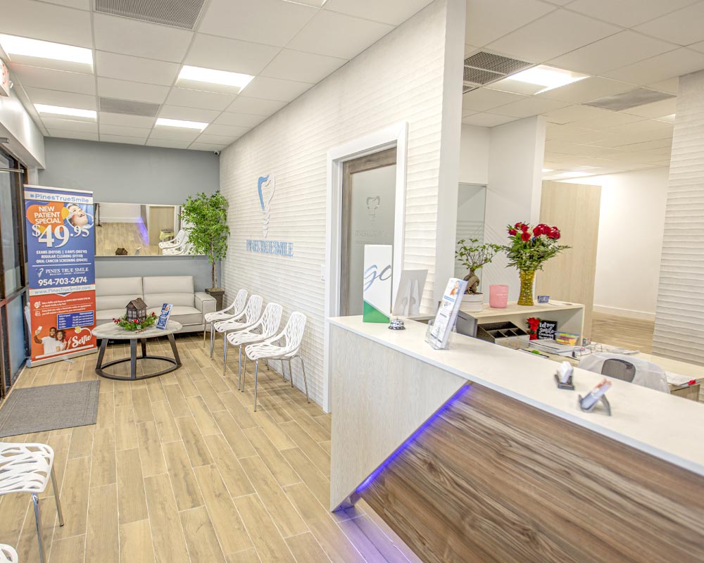 Home 3 Front desk and waiting room at Pines True Smile, a dentist in Pembroke Pines, FL